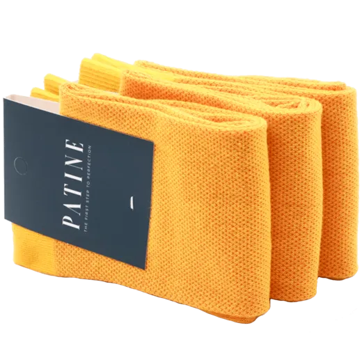 Casualowe męskie skarpety żółte w czerwoną mereżkę. Skarpety do trampek i butów eleganckich.